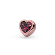 Close-up front view of 14k rose gold heart bezel stud highlighting rhodolite garnet end-only threadless top