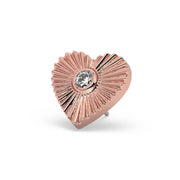 14k rose gold sunburst heart piercing stud end with diamond center, angled view showing depth and texture