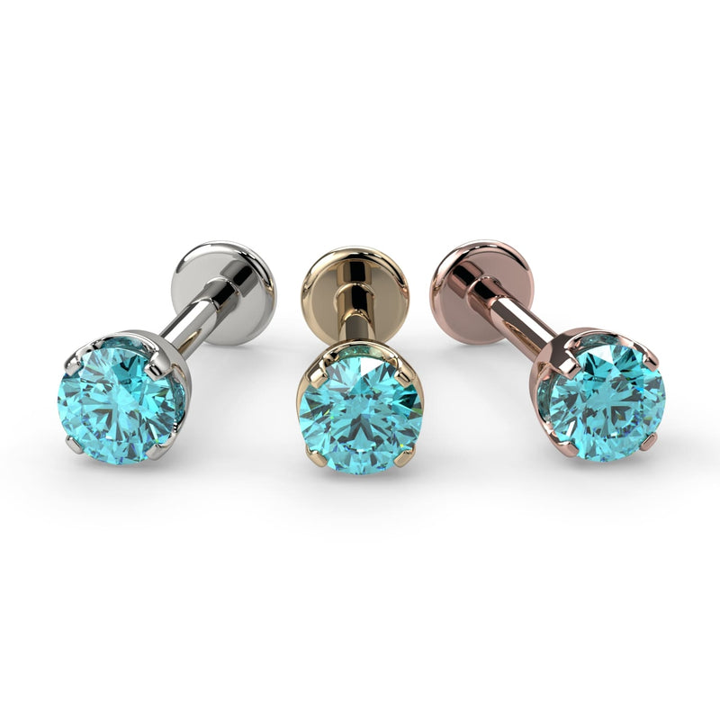 Aqua diamond flat back labret stud in all three metal options: 14k white, yellow, and rose gold side by side
