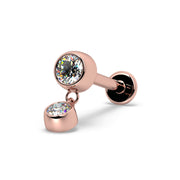 14k rose gold bezel diamond dangle flat back labret, angled view showing post and flat disc backing