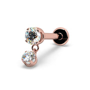 Angled view of 14k rose gold prong diamond dangle flat back cartilage stud with dangling round stone