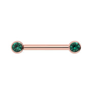 14K rose gold nipple barbell with dual 3mm bezel-set emeralds, front view