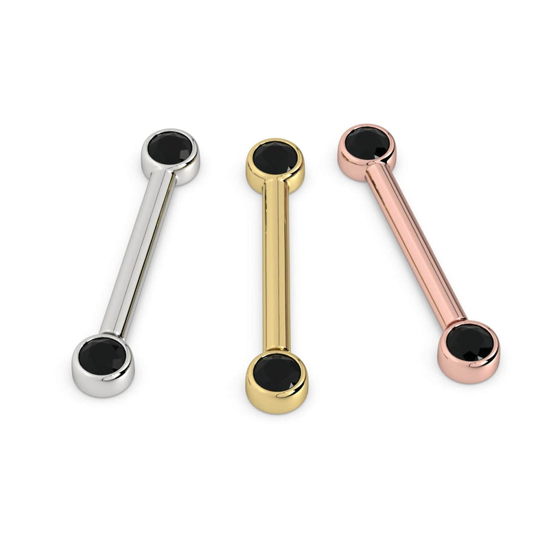 Black diamond bezel nipple barbell shown in all three 14K gold colors: white, yellow, and rose gold
