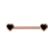 14k rose gold nipple barbell with bezel-set black onyx heart stones on each end, front view