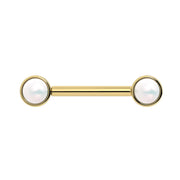 14K yellow gold Akoya pearl nipple barbell, straight-on front view of bezel settings