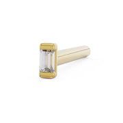14K yellow gold baguette diamond straight post nose ring, angled view showing bezel-set diamond and post