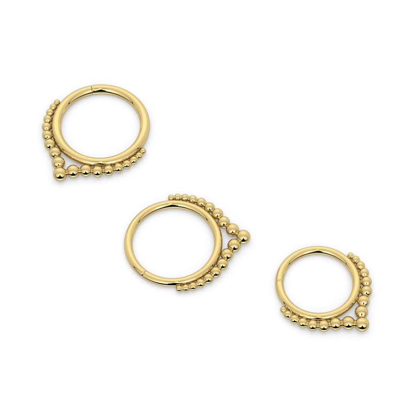 14k yellow gold Bali seam ring shown in three diameter sizes to compare fit and scale