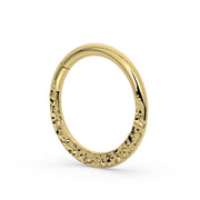 Side profile of 14k yellow gold hammered seam ring highlighting hand-hammered texture detail
