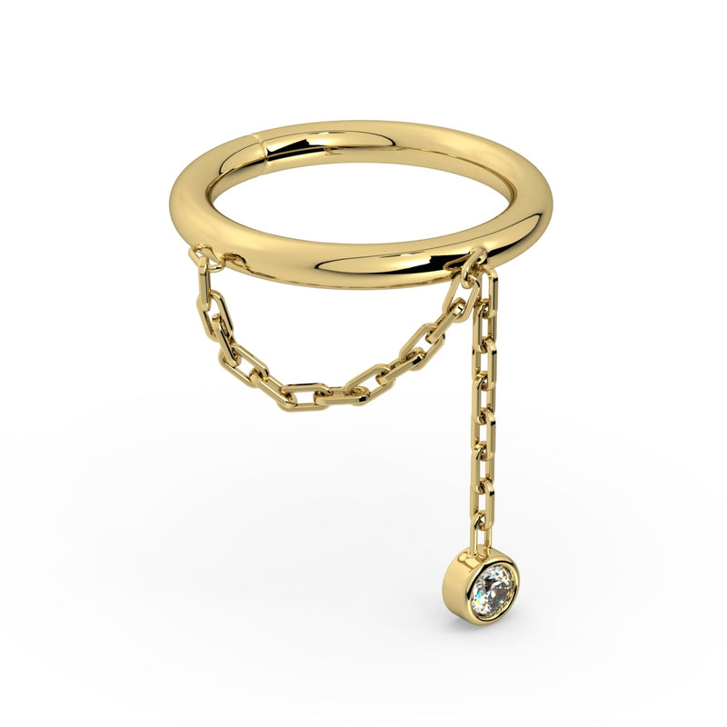 Angled side view of 14k yellow gold seam ring with paperclip chain and bezel CZ dangle