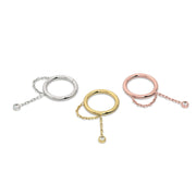 Shanti dangle seam ring in all three 14k gold colors: white, yellow, and rose gold