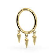 Angled side view of 14k yellow gold triple spike dangle seam ring showing ring depth and spike length