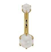 14k yellow gold Akoya pearl navel ring with dual prong-set pearls, front view showing barbell