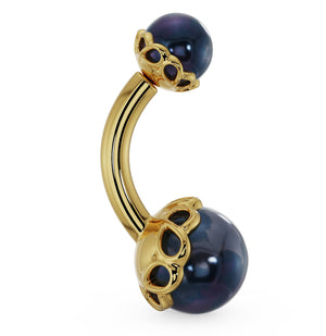 14k yellow gold belly ring with black Akoya pearls in ornate scroll setting, angled side view
