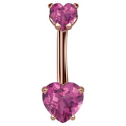 14k rose gold belly ring with dual pink CZ heart stones in four-prong settings, front view