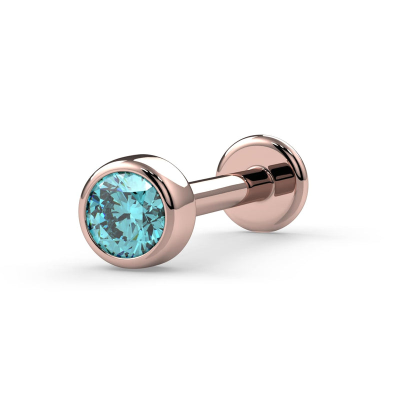 14K rose gold aqua diamond bezel flat back labret stud, angled view highlighting warm gold tone