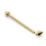 14k yellow gold spike industrial barbell shown at angle with one spike end detached, revealing internal threading