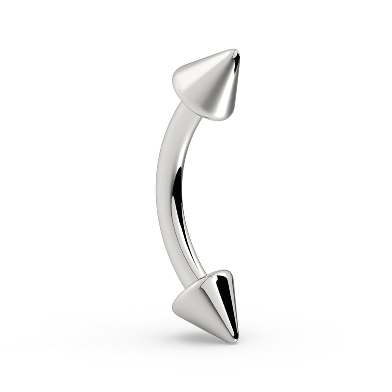 14K white gold spike curved barbell, upright side profile showing symmetrical cone spikes and curved bar