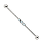 14k white gold industrial barbell with three bezel-set moonstone cabochons in bubble cluster setting