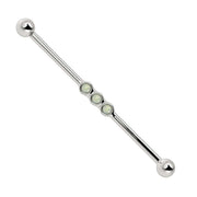 14k white gold industrial barbell with three bezel-set opal cabochons showing iridescent sparkle