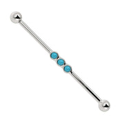 14k white gold industrial barbell with three bezel-set turquoise cabochons, front view