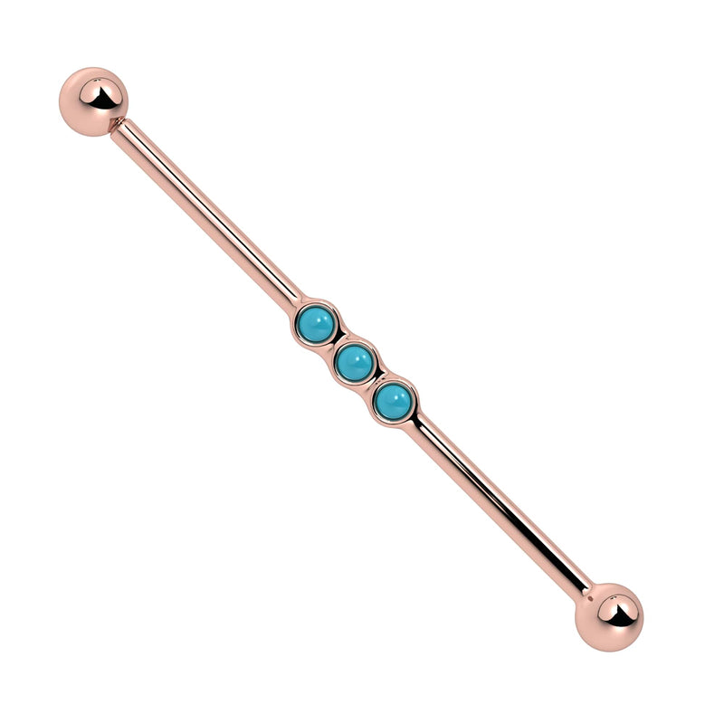 14k rose gold industrial barbell with three bezel-set turquoise cabochons, front view
