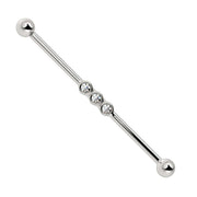 14k white gold industrial barbell with triple bezel-set CZ stones, front view