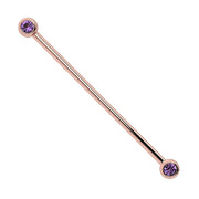 14k rose gold industrial barbell with dual bezel-set 3mm amethyst gemstones, front view