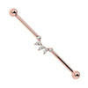 14k rose gold industrial barbell with CZ pear-cut arc cluster, front view on white background