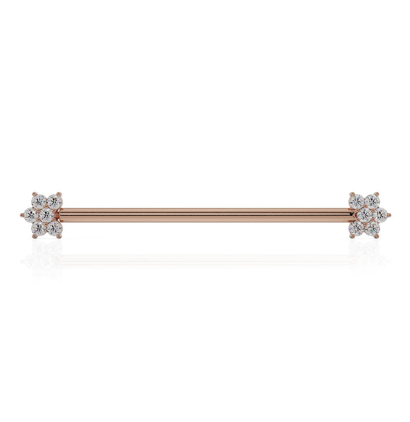 14k rose gold industrial barbell with cubic zirconia flower ends, straight front view