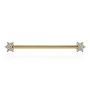 14k yellow gold industrial barbell with CZ flower ends, straight-on front view showing full length