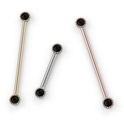 Black diamond Perlage industrial barbell shown in all three metal options: 14k yellow gold, white gold, and rose gold