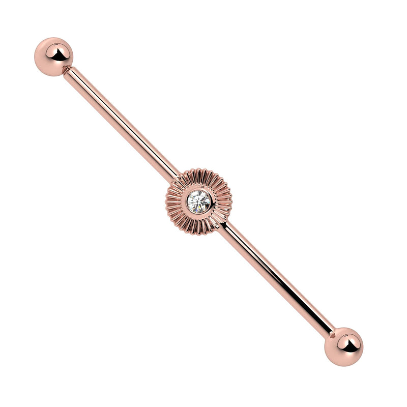 14k rose gold industrial barbell featuring radiant sunburst charm with CZ center, front view