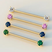 14k yellow gold industrial barbells in four CZ colors: clear, pink, blue, and green, side-by-side