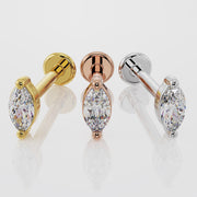 Side-by-side comparison of marquise diamond flat back stud in 14k yellow, rose, and white gold
