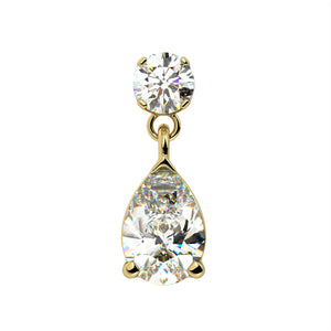 Close-up of 14k yellow gold diamond pear drop labret highlighting articulated drop link and prong setting