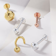 14k yellow gold, white gold, and rose gold dome flat back labretsshowing all three metal color options