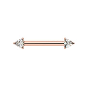 14k rose gold nipple barbell featuring dual trillion-cut diamond ends in prong settings, front view