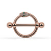 A rose gold snake nipple shield set with small green and clear stones, shown on a white background.