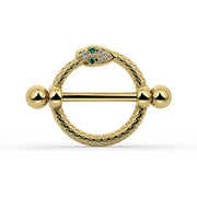 A yellow gold snake nipple shield set with small green and clear stones, shown on a white background.