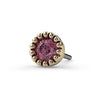 Close-up front view of 2mm pink diamond end in 14k yellow gold perlage bezel, threadless push-pin