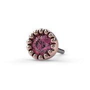 Close-up front view of 2mm pink diamond end in 14k rose gold perlage bezel, threadless push-pin