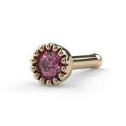 14k yellow gold pink diamond nose bone style, angled view showing ball-end post and milgrain setting