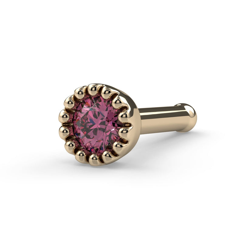 14k yellow gold pink diamond nose bone style, angled view showing ball-end post and milgrain setting