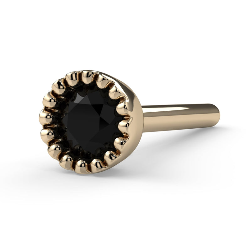 14k yellow gold black diamond perlage nose bone, slight side angle showing post and bezel profile