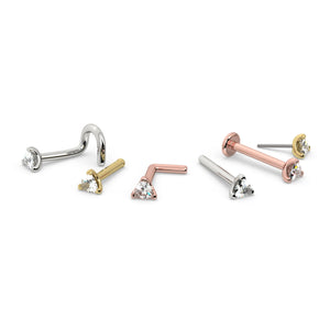 2.5mm trillion diamond nose ring in all three gold colors and multiple backing styles displayed together