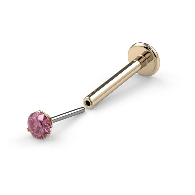 14k yellow gold pink diamond flatback labret nose stud, angled view showing flat disc backing and pin