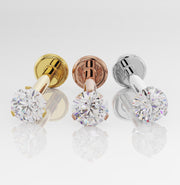 14k yellow gold, rose gold, and white gold 3-prong diamond flat back studs side by side, all three metal colors