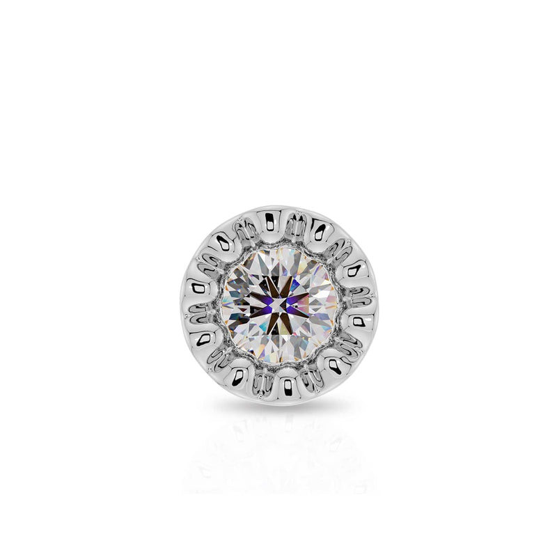 Close-up front view of white gold perlage bezel setting with round diamond and milgrain detail