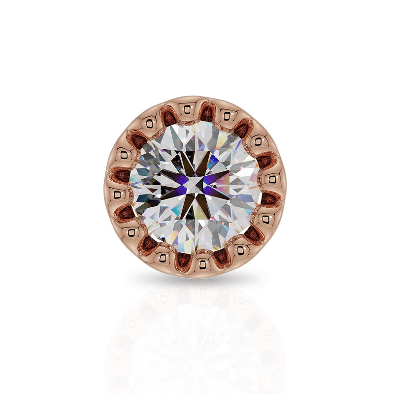 Close-up front view of 1.5mm diamond in 14k rose gold perlage milgrain bezel setting