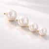 Four cultured pearl 14K gold internally threaded replacement balls showing size range from small to large